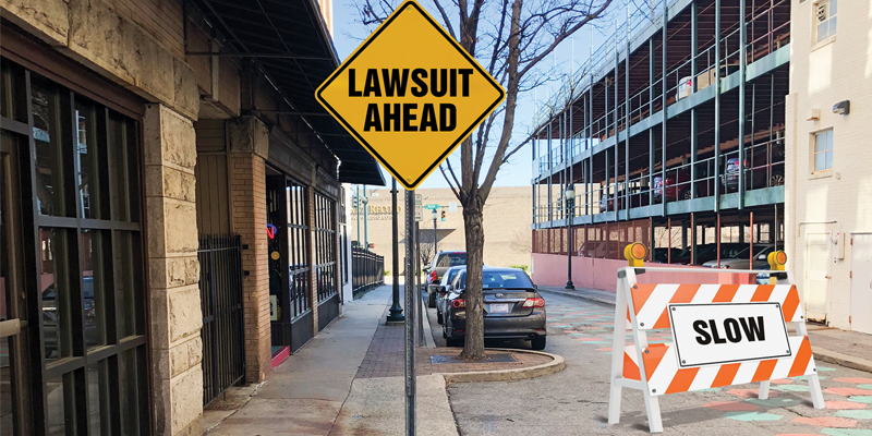 Lawsuit Could Put the Brakes on Construction of February One Parking Deck in Downtown Greensboro