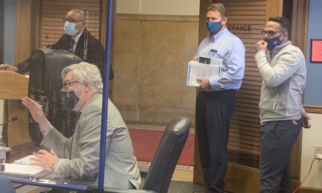 Trashy Commissioners Debate Two Rate Hikes