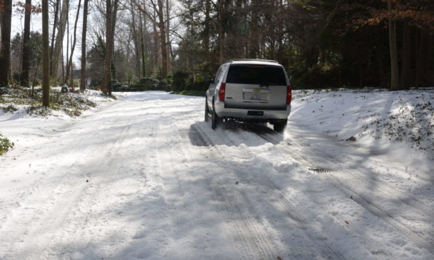 City Crews Battle Snow And Ice While Warming Centers Open