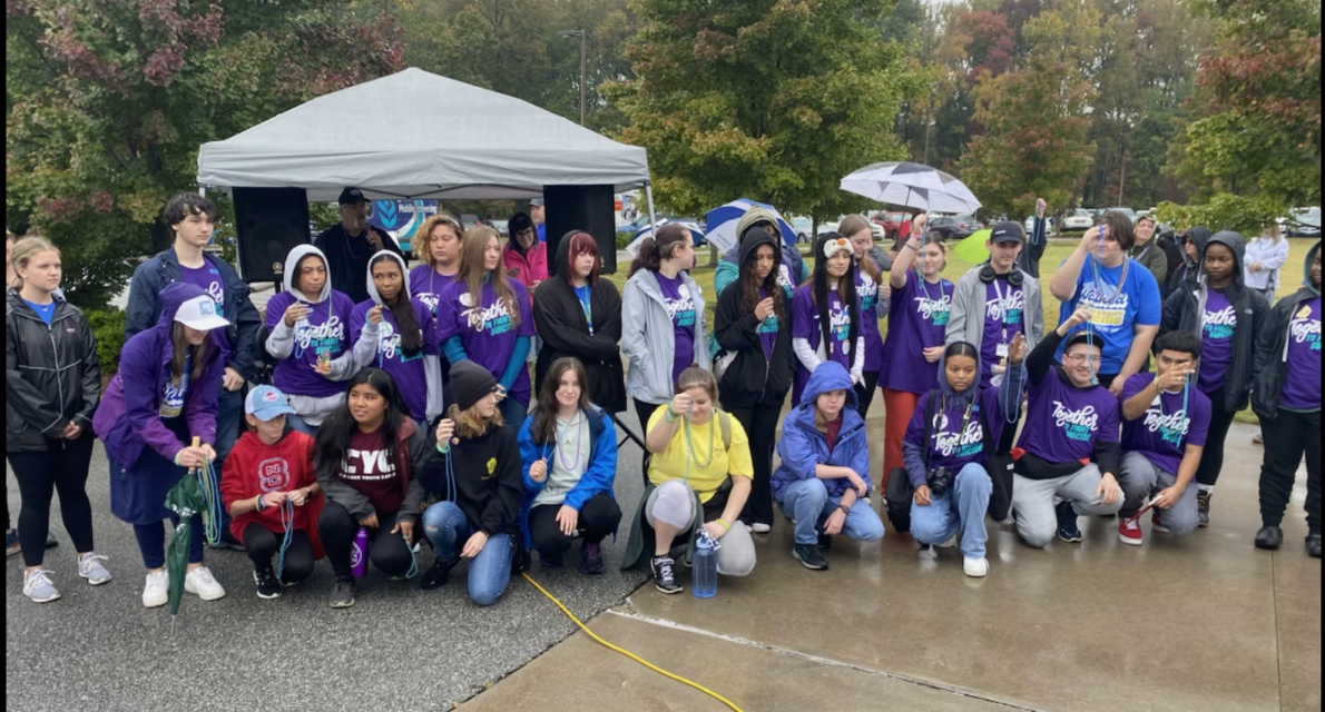 Suicide Loss Survivors Walk Into The Light On A Gloomy Day